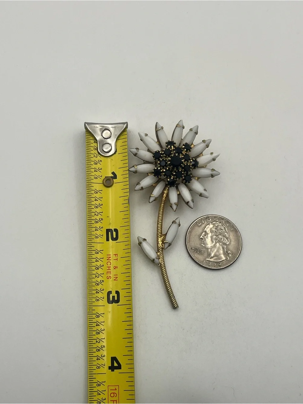 White milk glass black rhinestone daisy flower gold tone brooch pin vintage